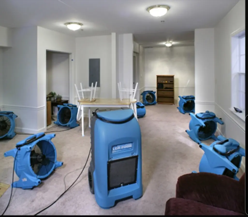 Air movers and dehumidifier setup for Water Damage Restoration in Uniontown